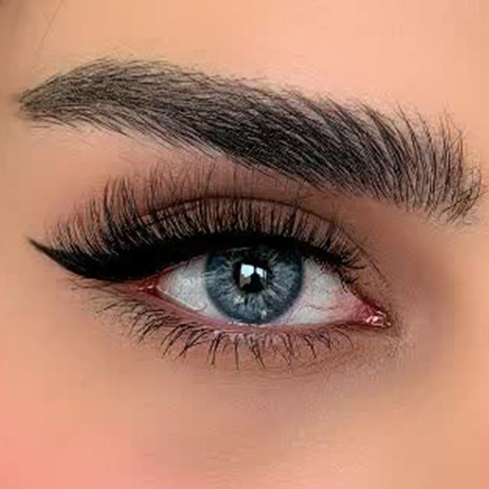 لنز رنگی آبی طوسی پنج بعدی ایندیگو یونیک روی چشم قهوه ای